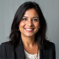 Professional portrait of Dr. Anya Sharma.
